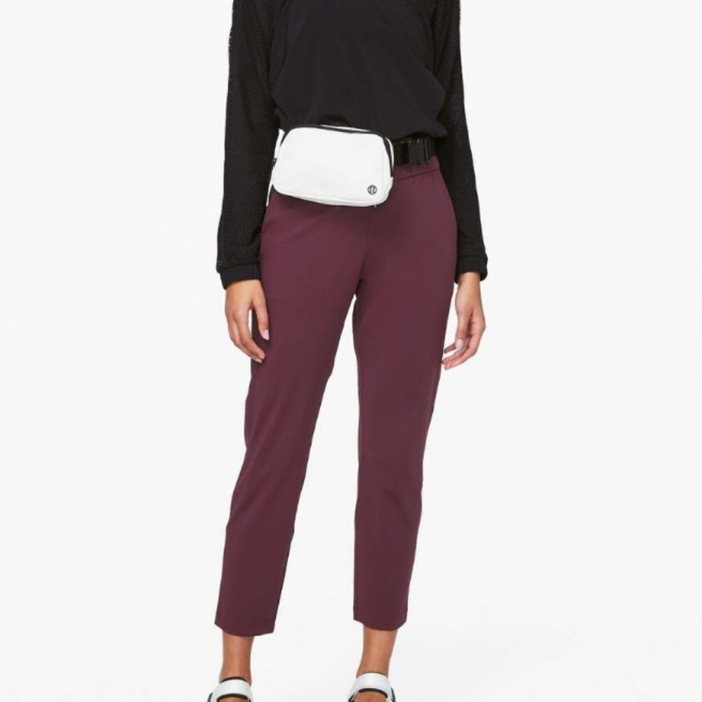 Lululemon On the Fly 7/8 high waisted pants  size 10 burgundy